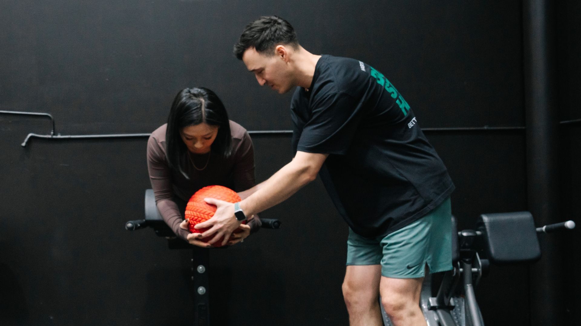 Experienced lifter training with a coach at Habitat Gym, a private gym in Prestons