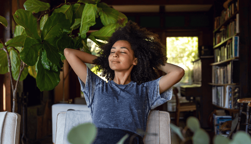 Woman relaxing to recover energy and avoid workout burnout