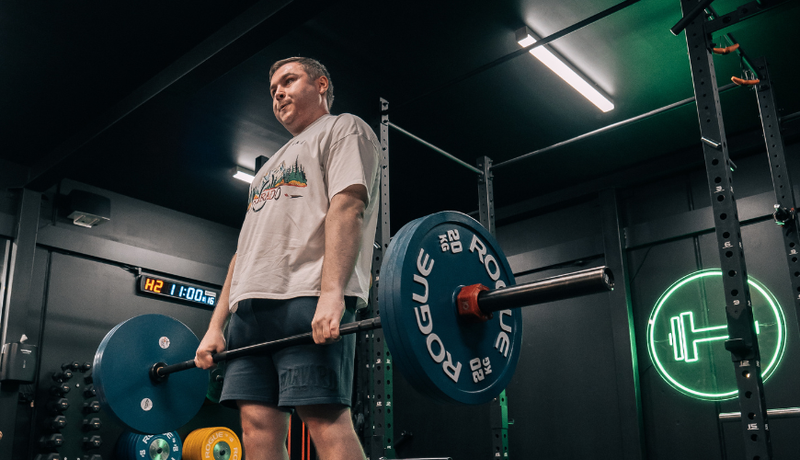 Man deadlifting at Habitat Gym during his workout session