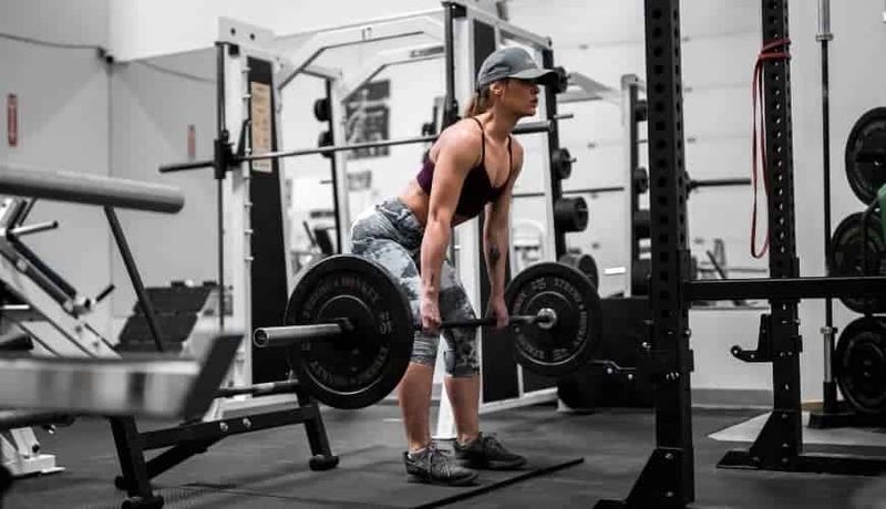 Focused woman deadlifting at Habitat Gym in Prestons