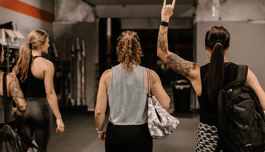 Women leaving the gym after a successful fitness session