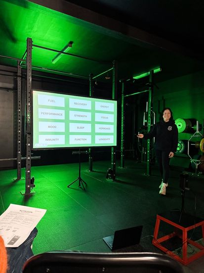 Coach presenting Nutrition Workshop at Habitat Gym to support long-term healthy habits